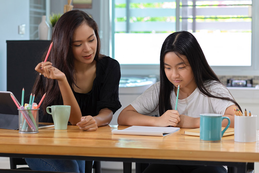 student and tutor together at a desk in Cincinnatti